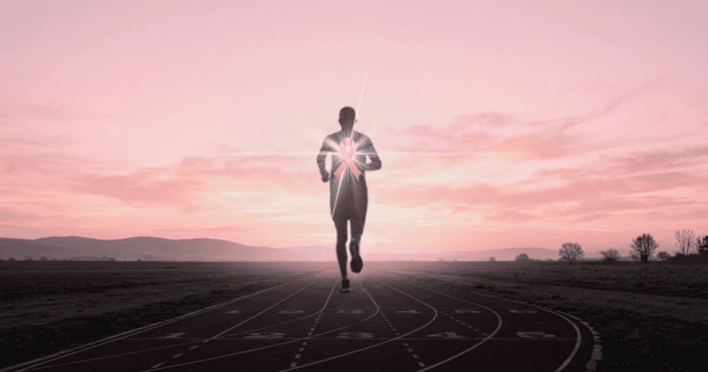 Coureur au lever du soleil portant un ruban rose, symbole d'Octobre Rose et du dépassement de soi